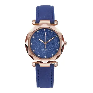Front view of elegant ladies watch with blue sparkly dial and leather strap