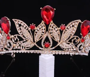 Detail of Baroque bridal crown with red water-drop rhinestones on gold base