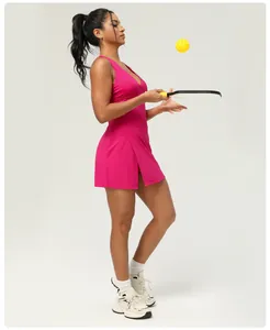 Side view of hot pink quick-dry athletic dress with open back and built-in bra