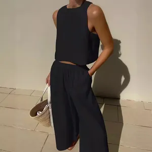 Women's 2-piece solid black sleeveless tank top and wide-leg pants loungewear set