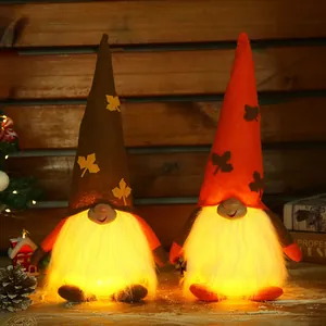 Decorative harvest festival light-up gnome figurines with glowing beards for Thanksgiving