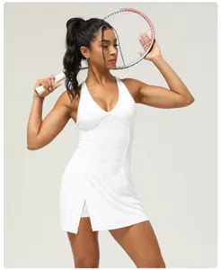 White sleeveless quick-dry tennis dress with backless design and built-in shorts.