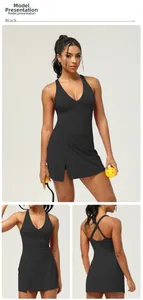 Detail view of black cross-back athletic romper dress with built-in chest pads