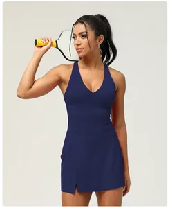 Sporty navy blue sleeveless tennis dress with built-in bra and racerback design