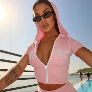 Fashionable pink hooded tracksuit set featuring rhinestone 1995 design and white zipper