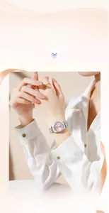 Elegant ladies' quartz watch with pink dial and diamond-set bezel on a silver band.