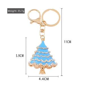 Measurement details for blue enamel Christmas tree keychain decorated with rhinestones