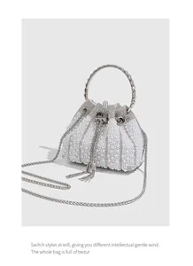 Elegant pearl and rhinestone evening bucket bag with crystal handle and metal chain