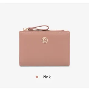 Front view of a pink minimalist bifold wallet featuring a stylish gold metal logo detail