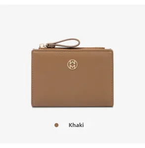 Close-up front view of a khaki textured leather wallet featuring a gold circular logo