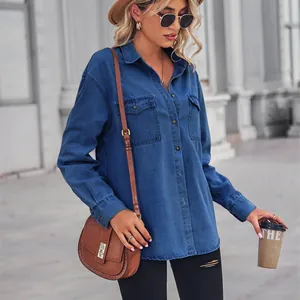 Stylish long-sleeved blue denim shirt for women, perfect for a street-style look.