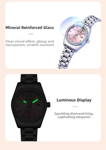 Detail of women's quartz watch with mineral glass and luminous hands