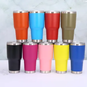 Set of colorful vacuum insulated travel tumblers with lids in various vibrant colors