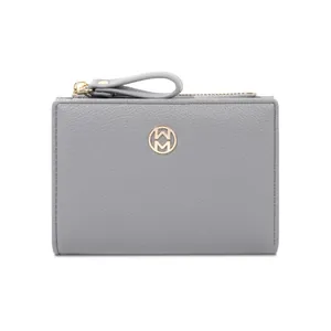 Minimalist gray leather bifold wallet for women with golden logo and zipper closure