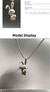 Macro view of a silver stainless steel rabbit pendant necklace with a sturdy box chain.