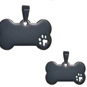 Set of bone-shaped matte black pet ID tags with detailed hollow paw print design
