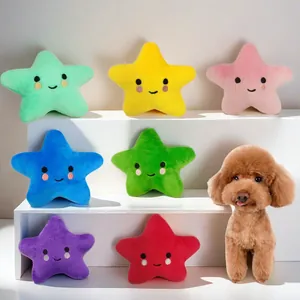 Close-up detail of seven colorful star-shaped plush squeaky toys for pets on shelf