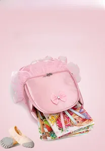 Macro detail showing the spacious interior and storage of this pink ballet backpack for girls