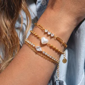 Elegant layered gold titanium steel bracelets with heart crystals and shell pearls jewelry