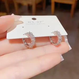Sparkling cubic zirconia small hoop earrings for women, silver tone minimalist jewelry