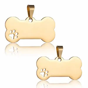 Bone-shaped golden stainless steel pet ID tag with a hollow paw print design cutout