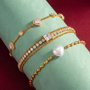 Gold plated titanium steel bracelets set with heart stones and pearls for stylish women