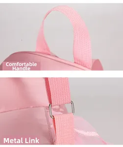Detail view of pink dance backpack featuring comfortable handle and hardware connection