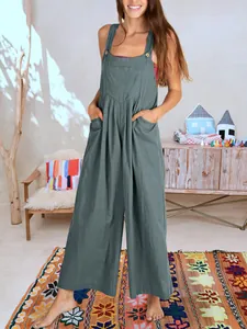 Mono casual de algodón y lino gris con perneras anchas y botones de madera chic