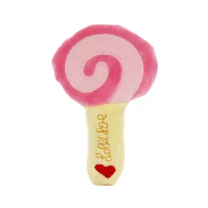 Pink plush lollipop squeaky dog toy featuring Lolly Pop embroidery and a red heart