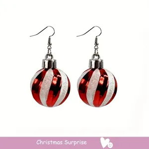 Close-up of red and white striped round Christmas ball earrings on a clean white background.