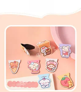 Detailed view of cute cartoon animal and food shaped magnetic bookmarks for students
