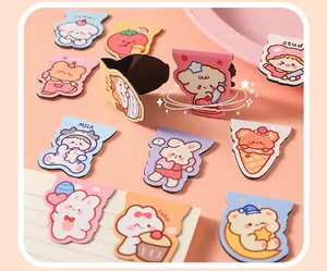 Detailed view of various cute cartoon magnetic bookmarks showing folding design
