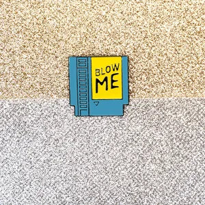 Retro NES style game cartridge enamel pin with 'Blow Me' funny text metal brooch badge