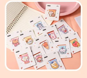 Detailed close-up of colorful cartoon magnetic bookmarks on white backing cards