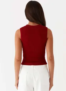 Back view of a slim-fit ribbed sleeveless knit tank top in a deep burgundy red color.