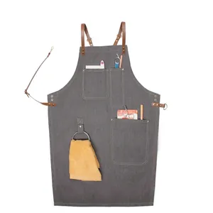 Tablier de travail en denim gris avec lanières en cuir réglables et poches outils