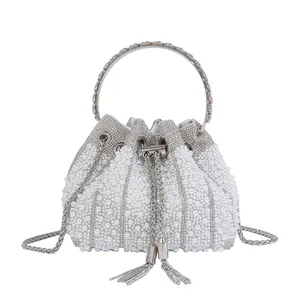 Elegant silver rhinestone and pearl evening bucket bag with tassel and silver chain strap