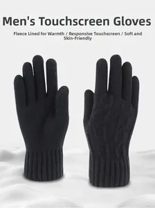 Detail view of black knitted touch screen gloves with ribbed cuffs and soft fleece lining.