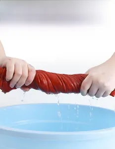 Close-up demonstration showing the excellent color fastness of red checkered fabric