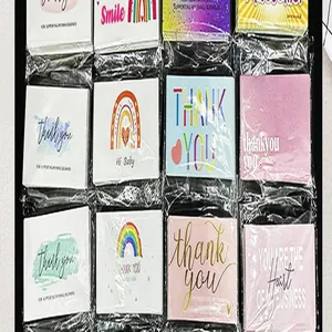 Assorted English thank you and greeting cards with various colorful designs in individual packaging