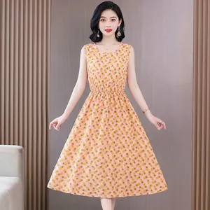 Pink sleeveless midi dress featuring yellow pineapple print and cinched waist design.