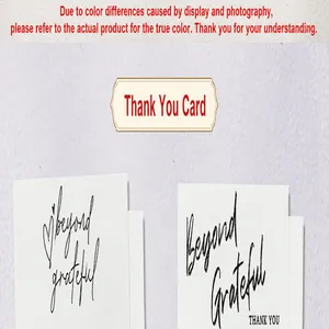 Close-up of white thank you cards with elegant black cursive Beyond Grateful text