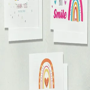 Detail of premium English thank you cards with colorful rainbow and heart patterns.