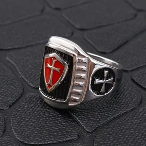 Vintage Crusader stainless steel signet ring featuring a red enamel cross shield design