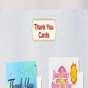 Close-up detail of premium colorful thank you cards with smiling sun icon and gradient pattern