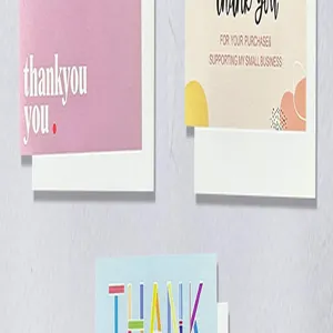 Close-up of three different high-quality 'Thank You' greeting cards with elegant typography