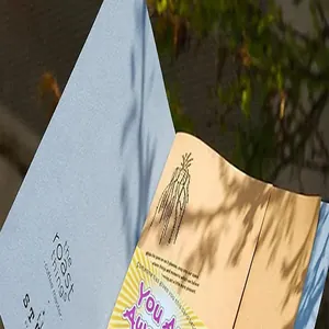 Close-up of elegant English thank you card and envelope with artistic anatomical heart print