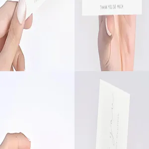 Close-up detail of white 'Thank You So Much' cards for small business owners