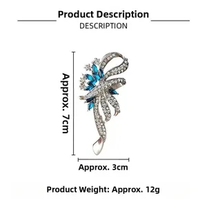 Detail view showing blue crystal brooch dimensions 7x3cm and 12g weight