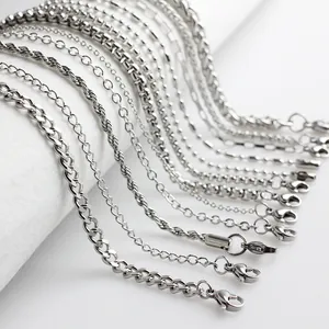 Close-up of various stainless steel chain styles including rope and box chains